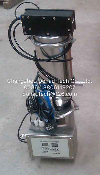 Fluidized bed coating system